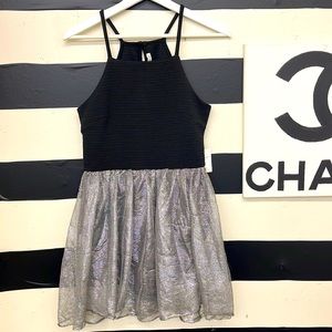 NWT Black with metallic silver. Bodysuit underneath. Size medium